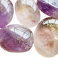 Side-on view of purple Amethyst palm stone, Madagascar-sourced.