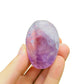 Detail shot of Grade AA Amethyst palm stone under natural light