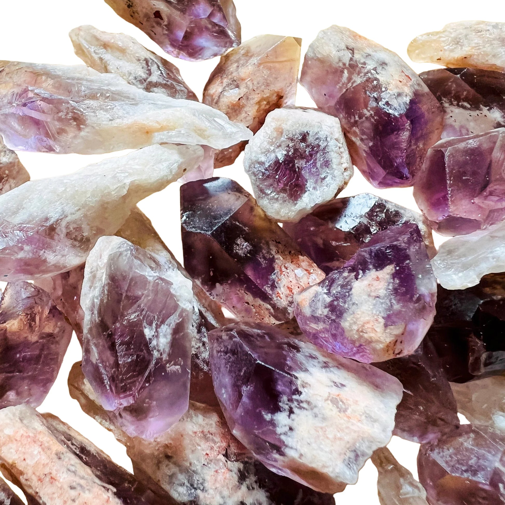 Natural light view of one Amethyst raw point for scale, sourced from Zambia.
