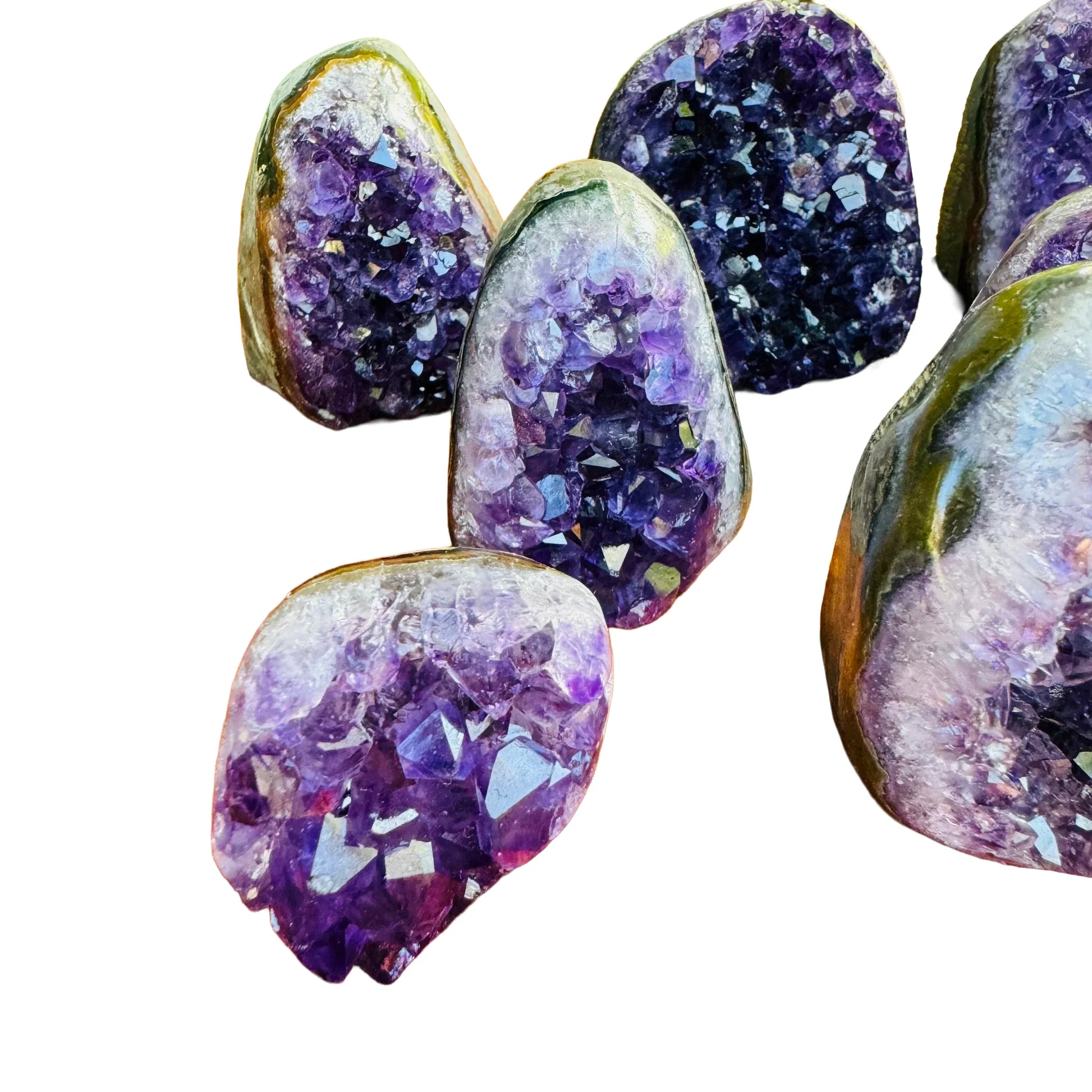 Profile view of Amethyst raw geode, often paired with practices around Stress Relief and Sleep, sourced from Artigas, Uruguay.