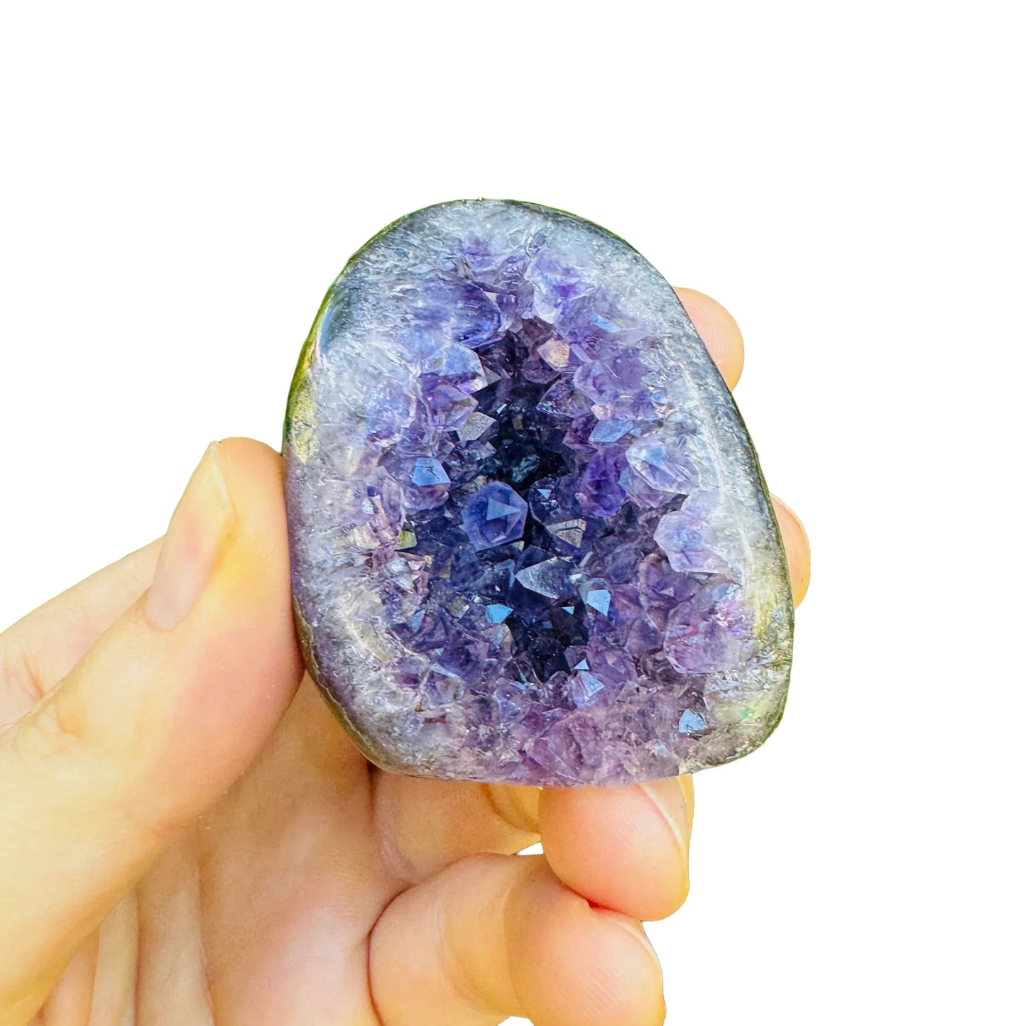 Lifestyle view of a single Amethyst raw geode from Artigas, Uruguay.