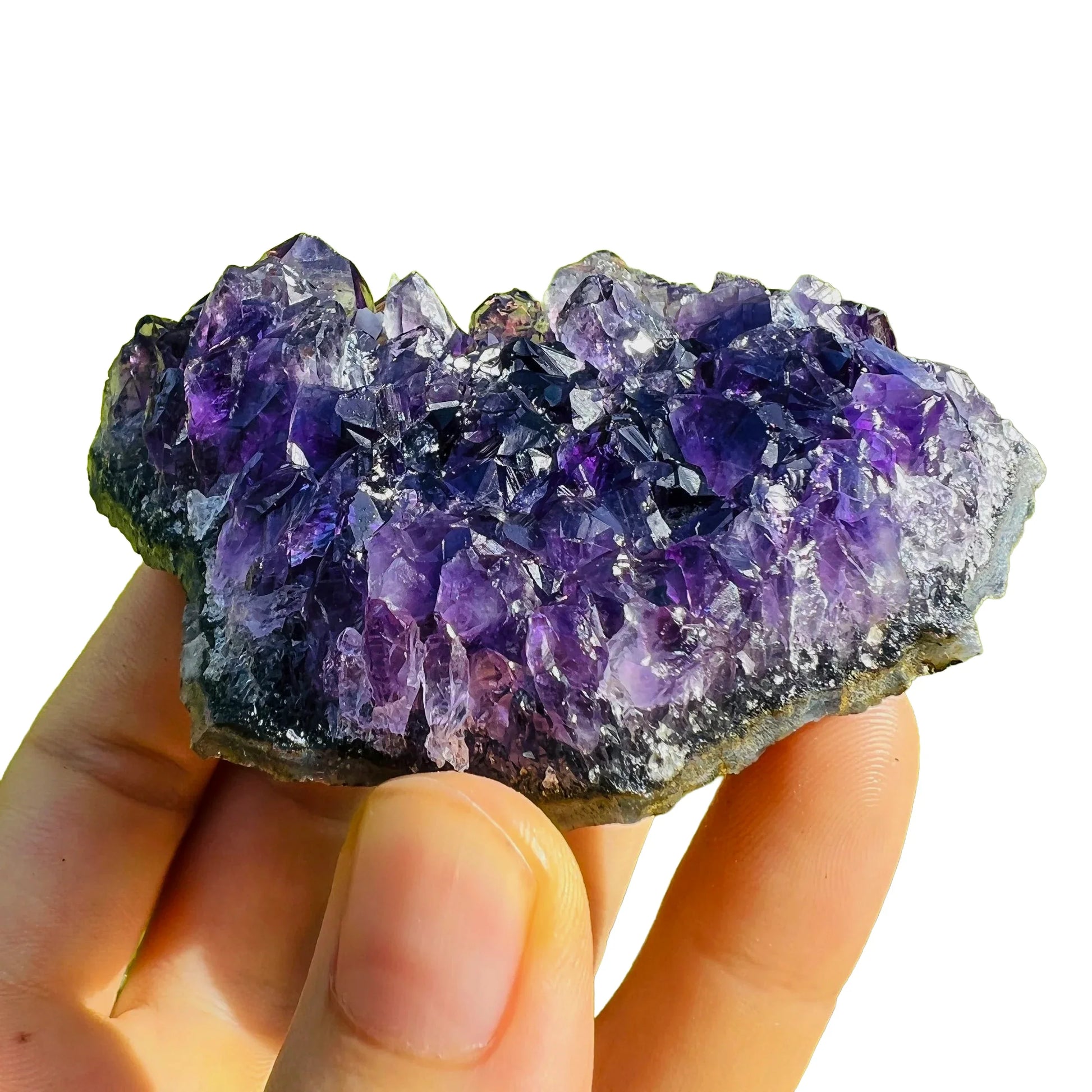 Detail shot of Grade AAA Amethyst cluster under natural light