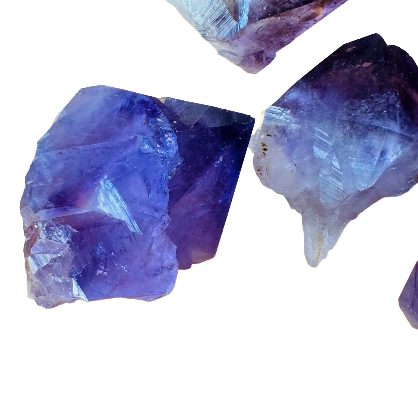 Natural light view of a Amethyst raw point for Stress Relief.