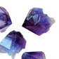 Grade aaa amethyst point held in hand for size reference