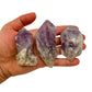Top-down shot of purple Amethyst raw point, showing characteristic color.