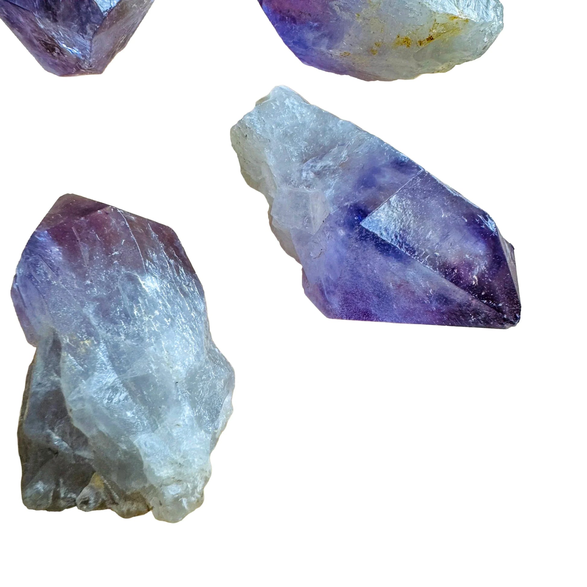 Grade a amethyst point held in hand for size reference