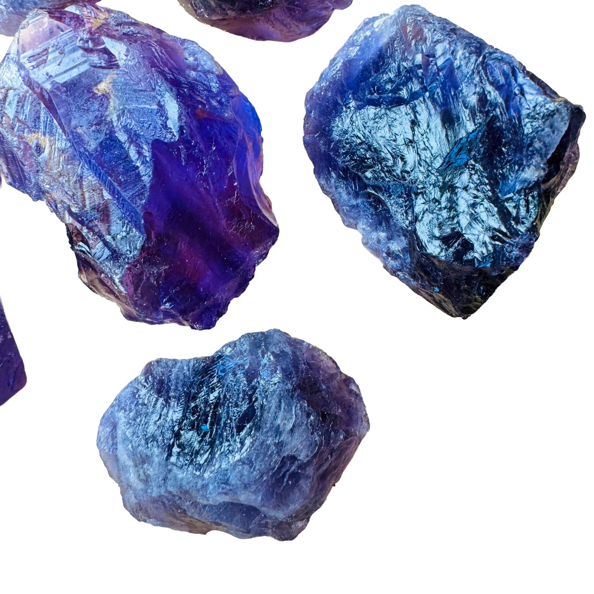 Lateral view of Grade AA purple Amethyst raw stone, hand-selected from Rio Grande do Sul, Brazil, showing natural variation.