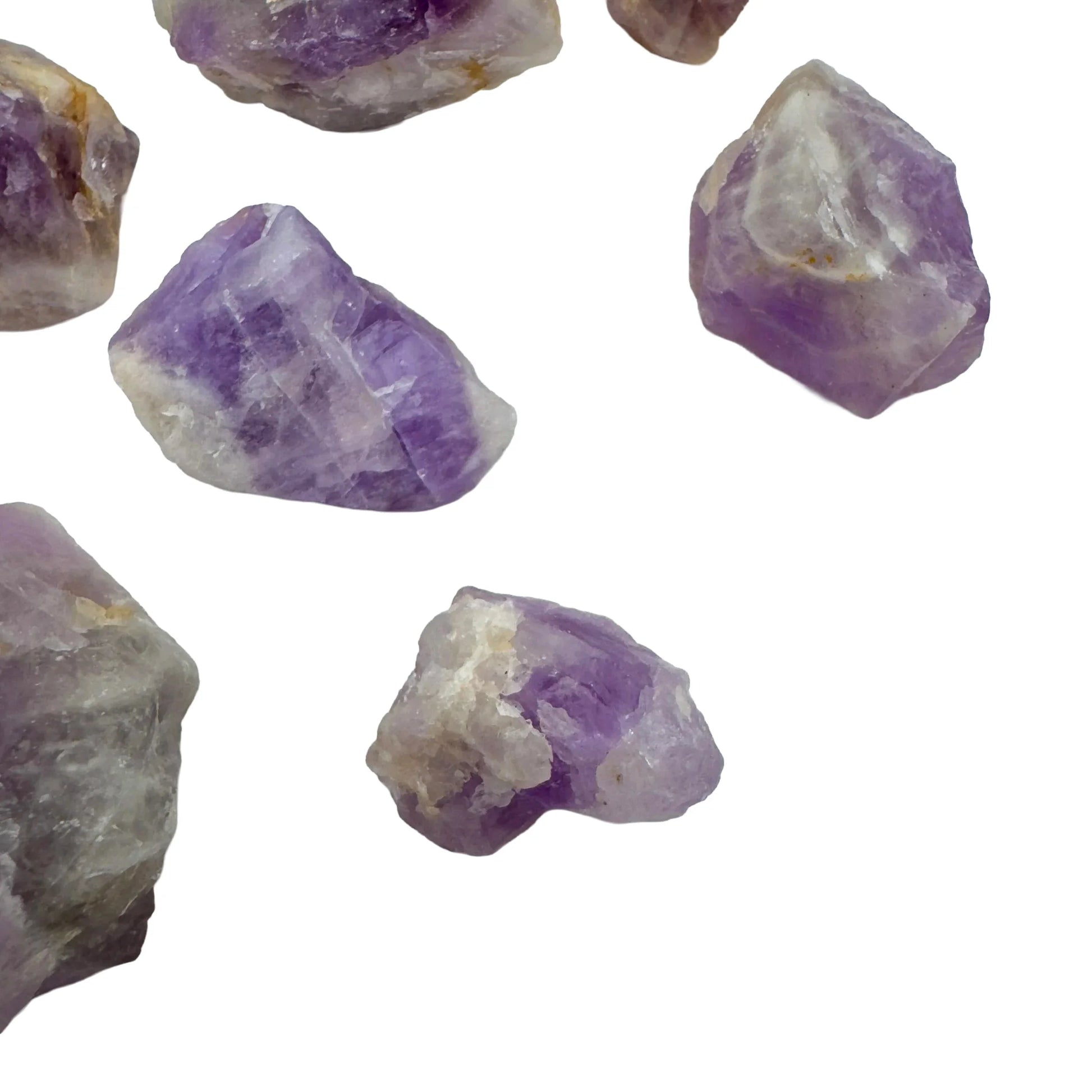 Top-down shot of Grade A Amethyst raw stone, showing subtle veining.