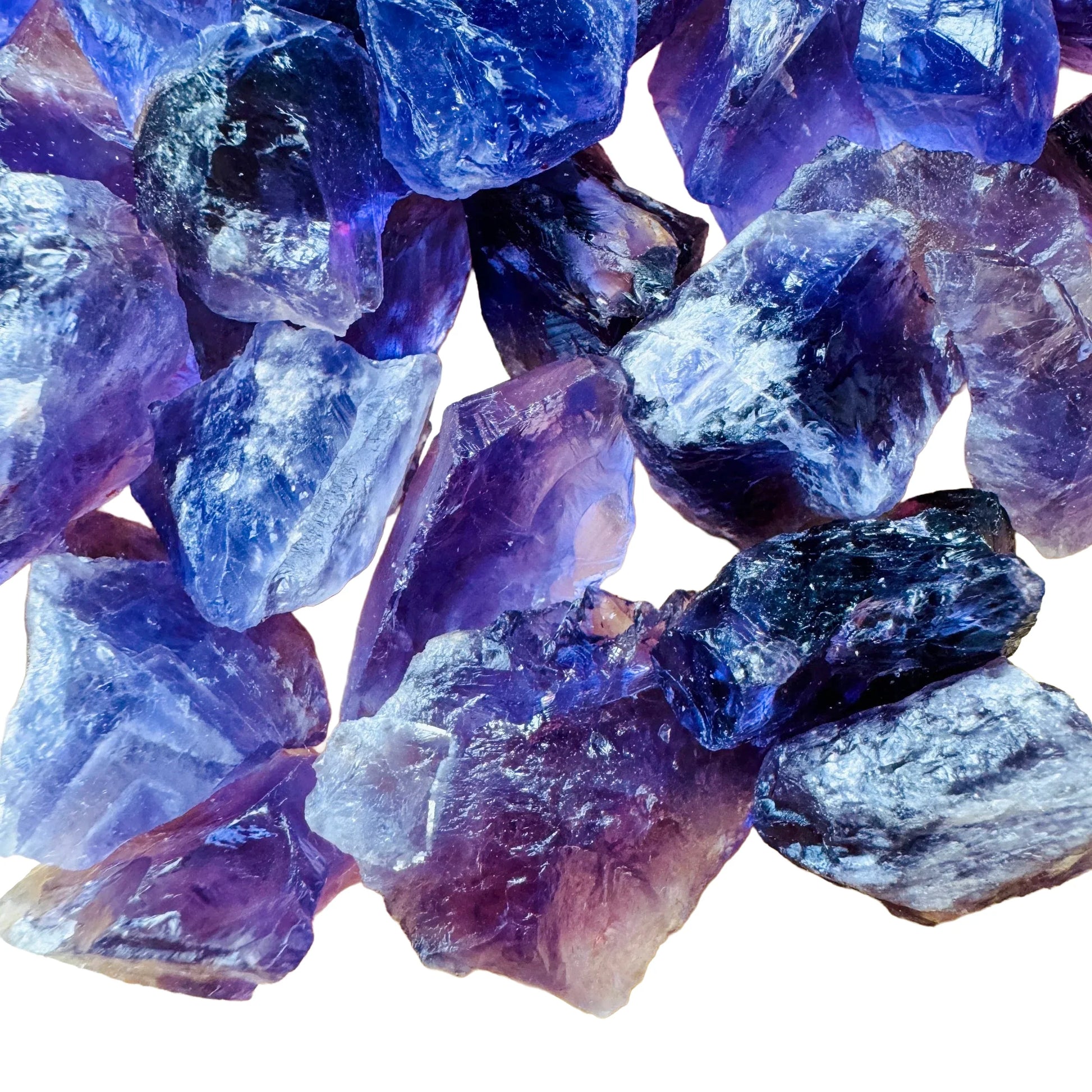 Held in hand, a single Amethyst raw stone sourced from Brazil.