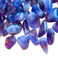 Near view of Amethyst tumbled stone, sourced from Madagascar.
