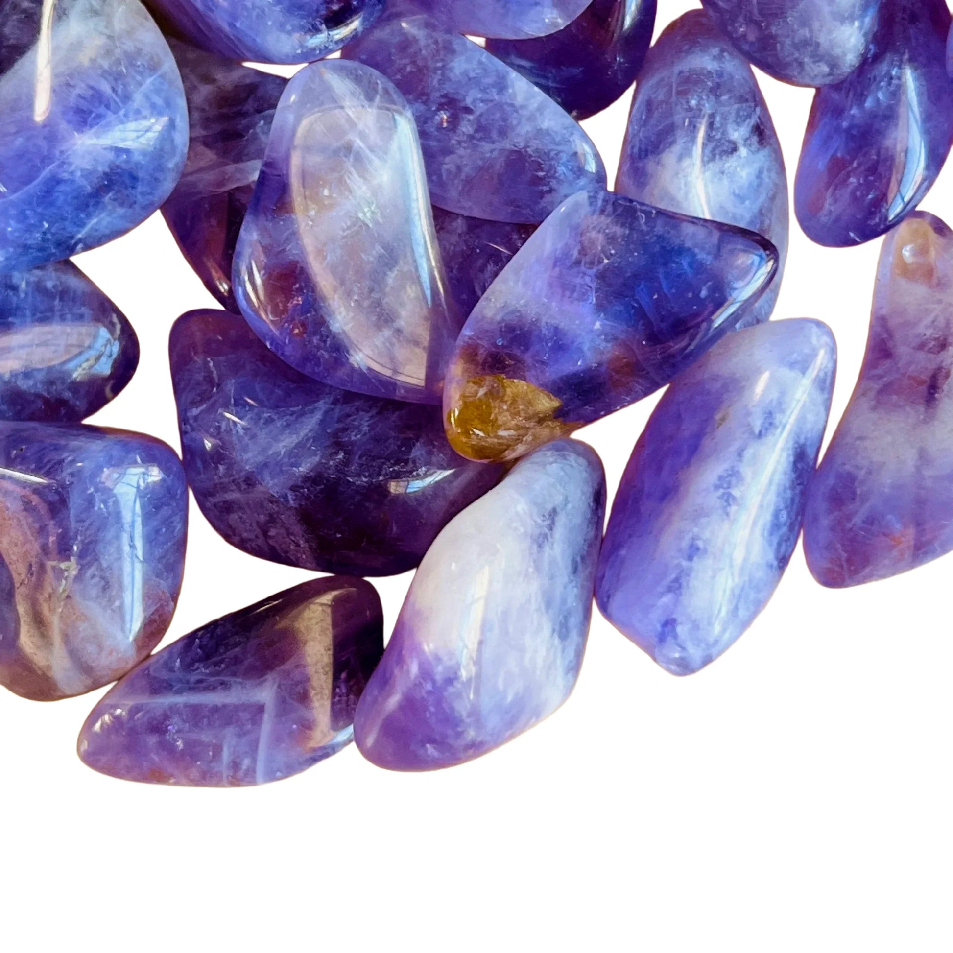 Lateral view of Amethyst tumbled stone, drawn on for Stress Relief.