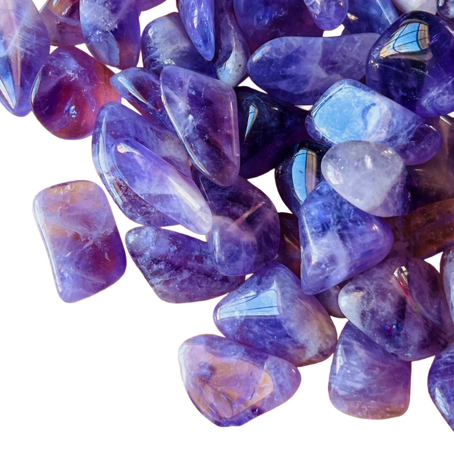 Rear view of Amethyst tumbled stone, hand-selected from Analamanga, Madagascar, showing earthy tone.
