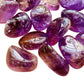 Near view of Amethyst tumbled stone, showing matte finish, to support Stress Relief.
