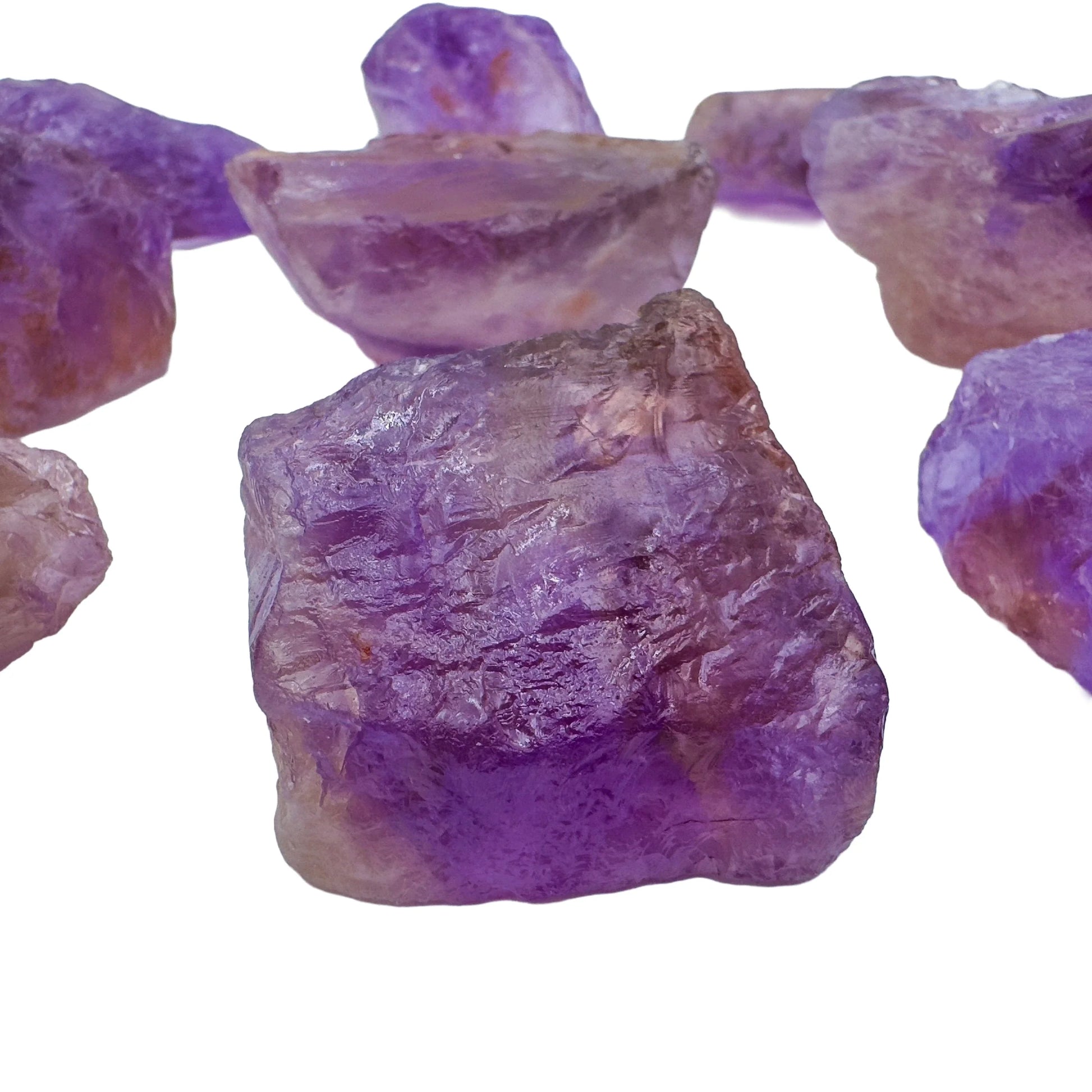 Overhead view of Ametrine raw stone, showing untreated character, to support Focus and Manifestation.