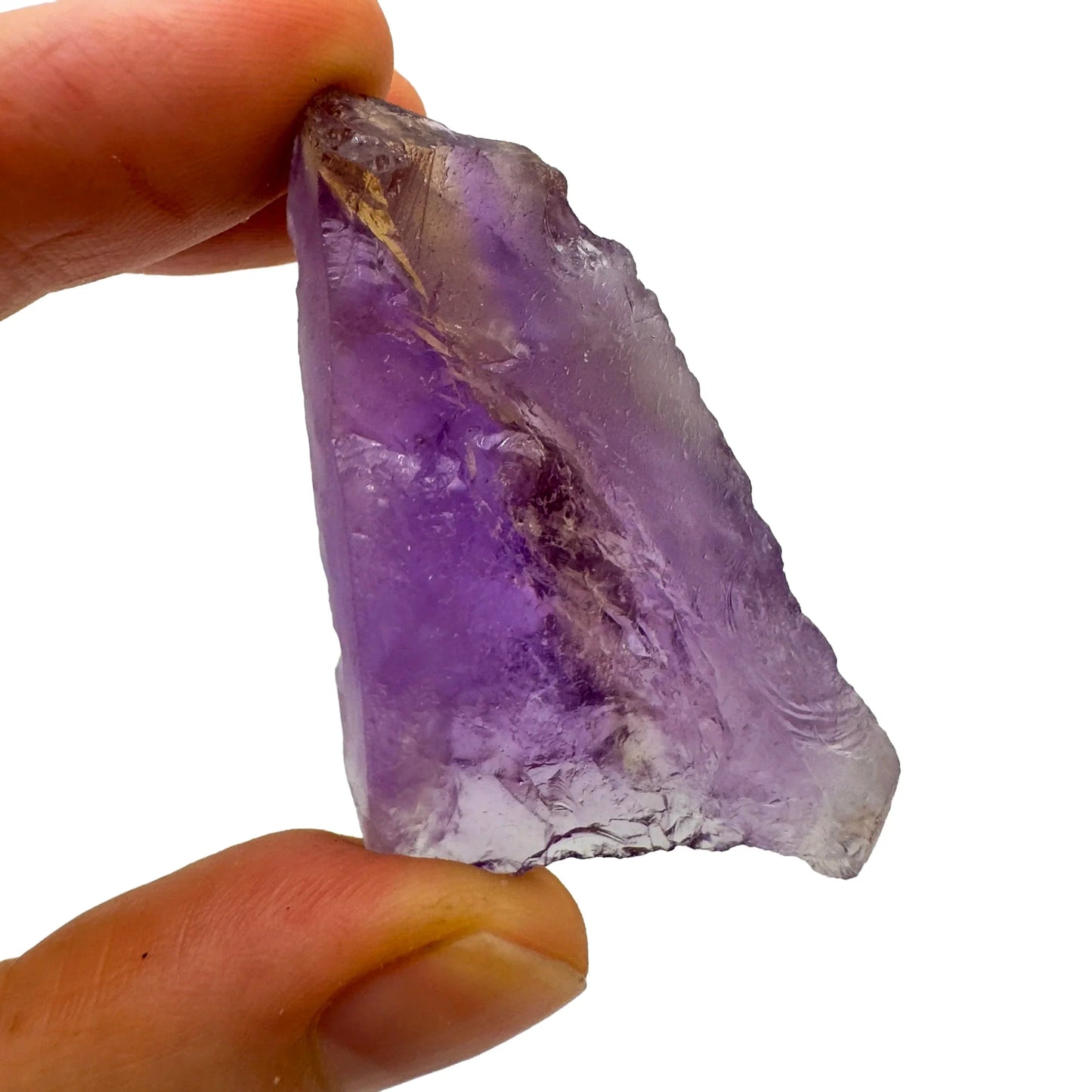 Edge-on view of Ametrine raw stone, traditionally used for Focus, showing characteristic color.