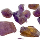 Grade aa ametrine raw held in hand for size reference