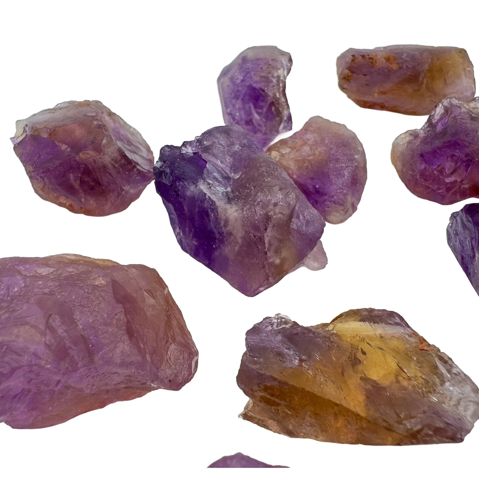 Grade aa ametrine raw held in hand for size reference