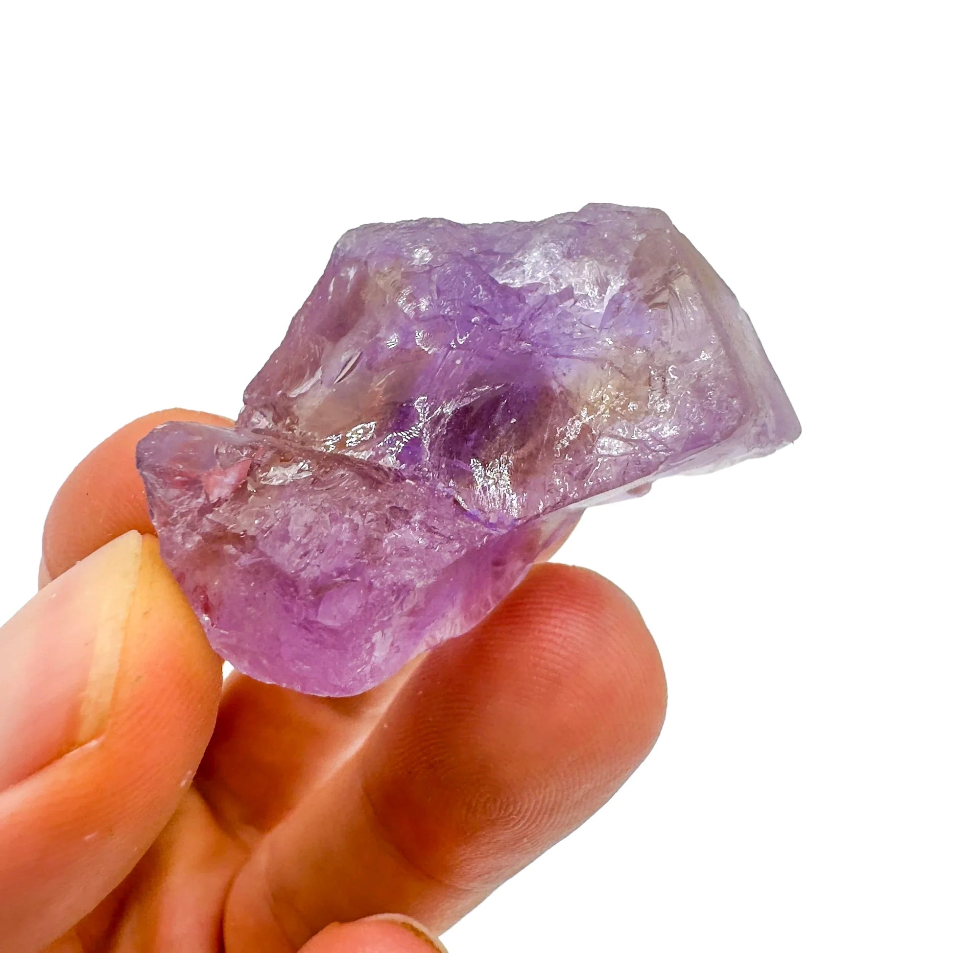 Detail shot of Grade AA Ametrine raw under natural light