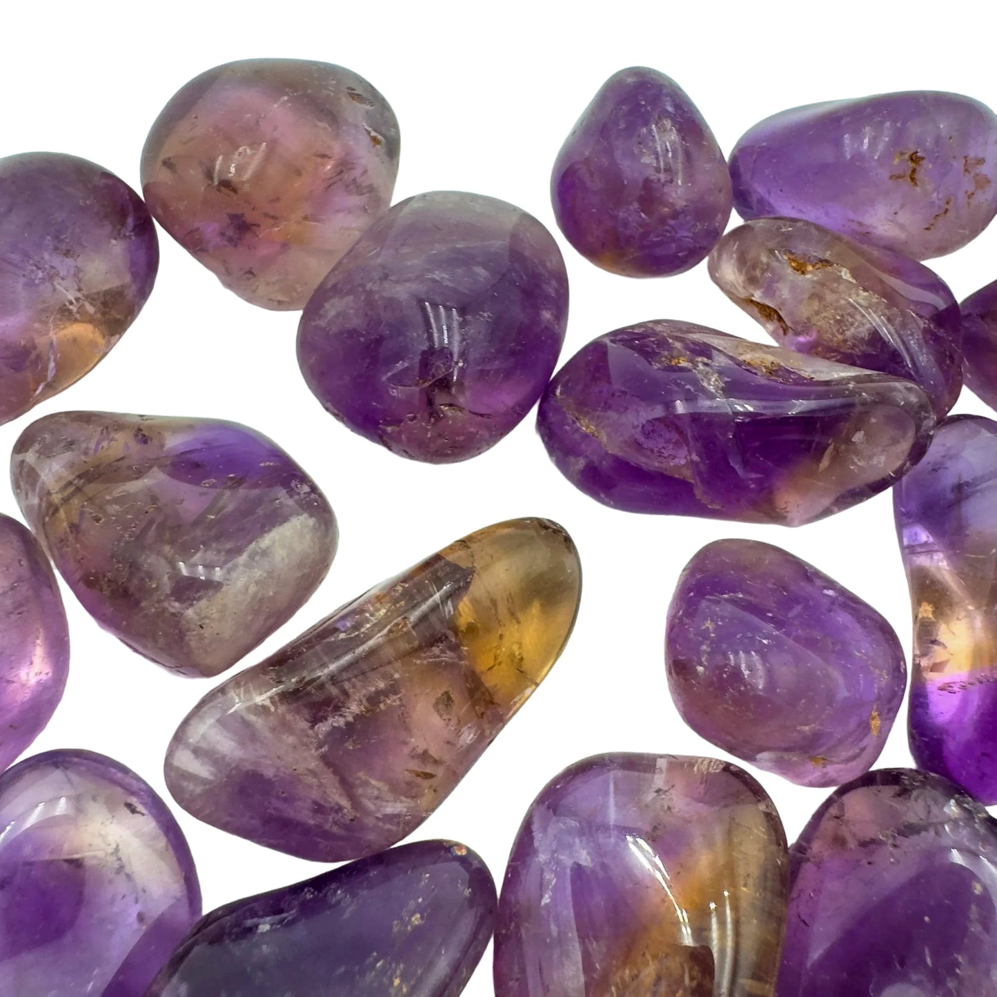 Wider context of Ametrine tumbled stone, from Ángel Sandoval Province, Bolivia, linked to Focus, with natural details visible.