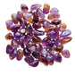Detail shot of Grade AAA Ametrine tumbled stone under natural light