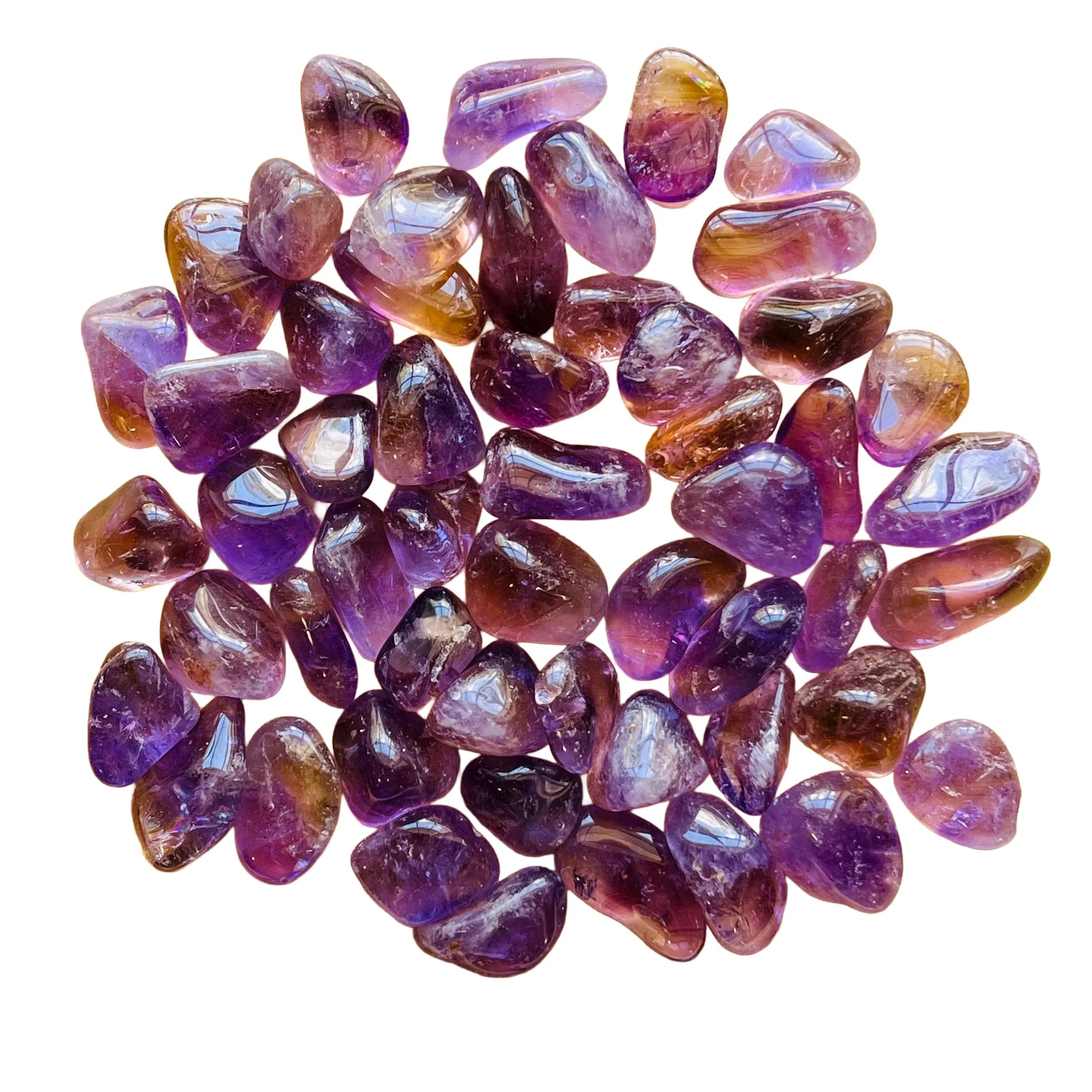 Detail shot of Grade AAA Ametrine tumbled stone under natural light