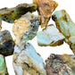 Alternate angle of Blue Opal raw stone, sourced from Arequipa, Peru, turned to for Emotional Healing and Stress Relief.