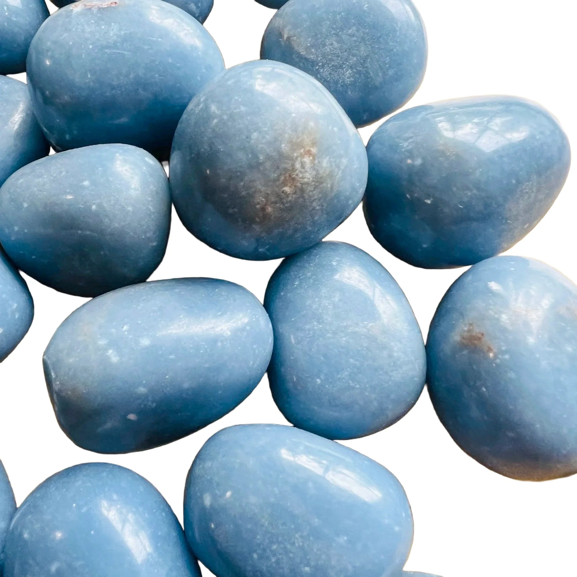 Bottom side of Angelite tumbled stone, showing characteristic color.
