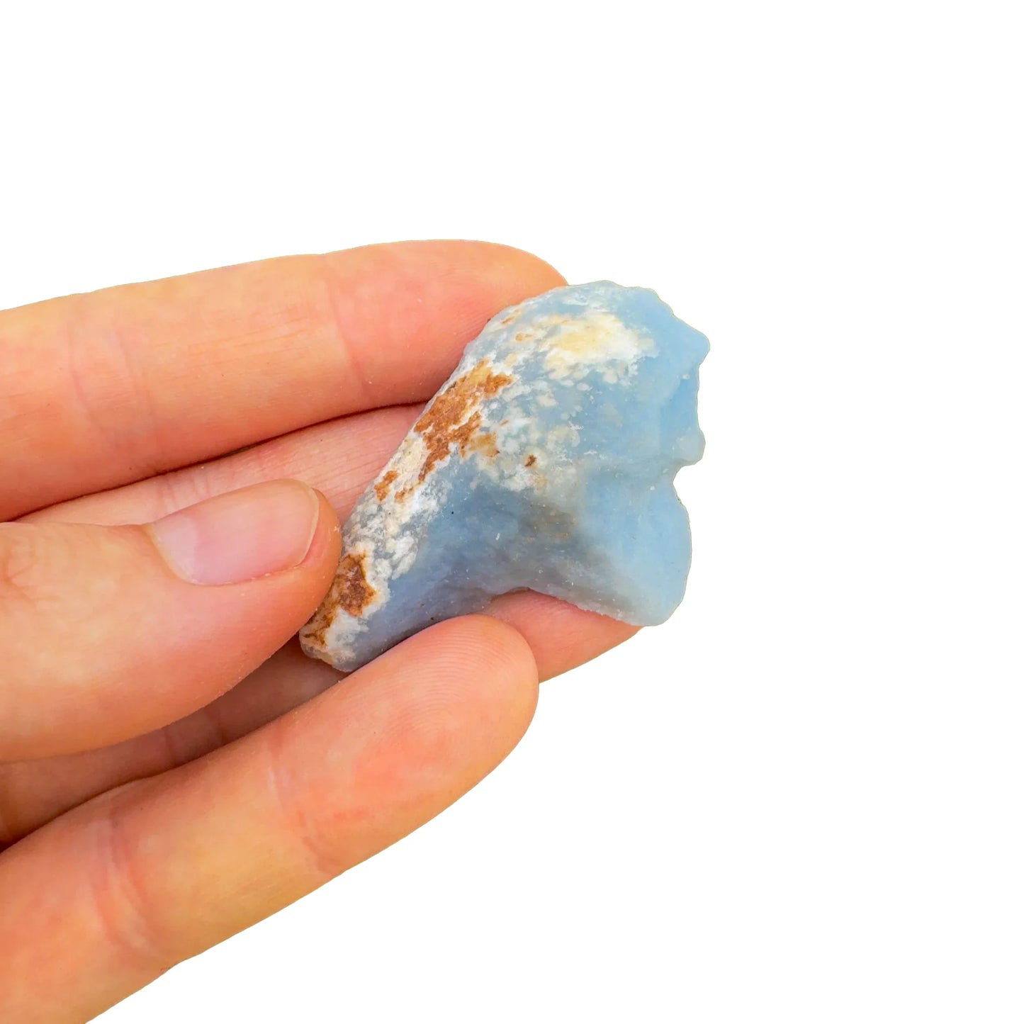 Grade a angelite raw held in hand for size reference