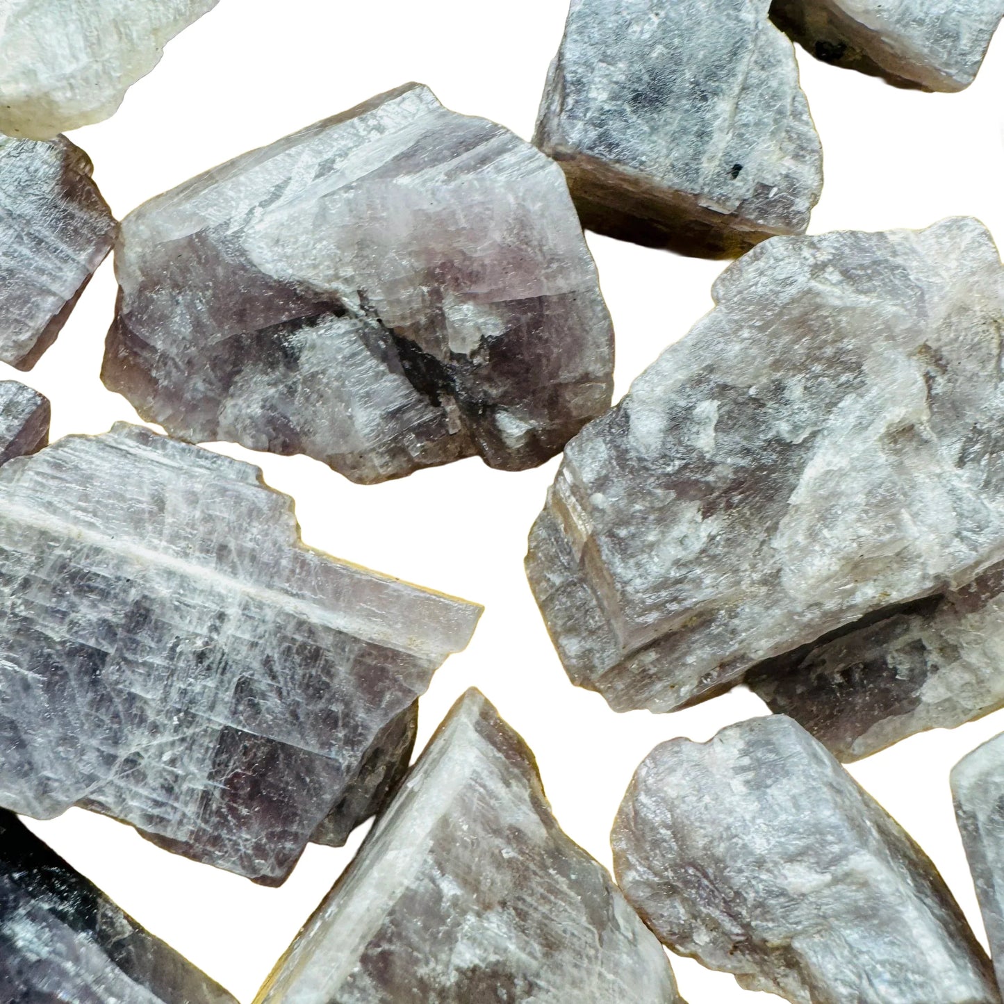 Side perspective of Anhydrite raw stone, showing raw matrix, for Meditation and Stress Relief.