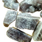 Hand-scale shot of a single Anhydrite raw stone from Androy, Madagascar.