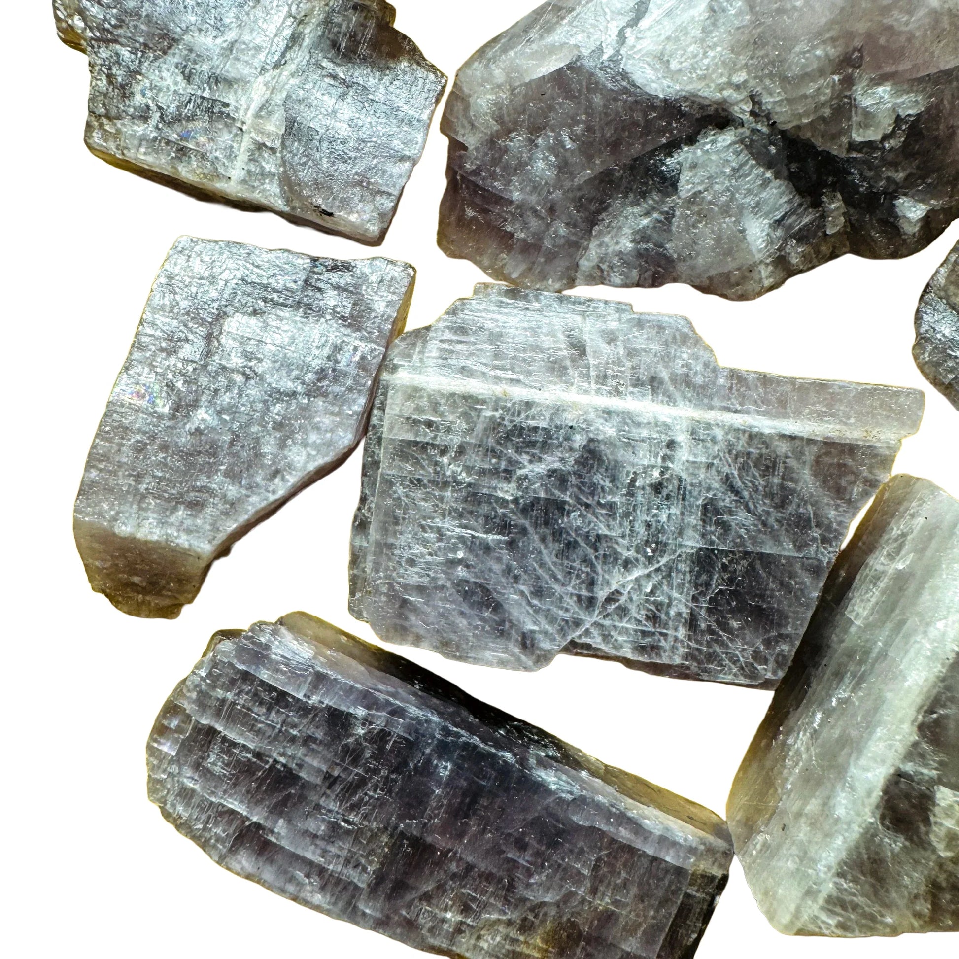 Hand-scale shot of a single Anhydrite raw stone from Androy, Madagascar.