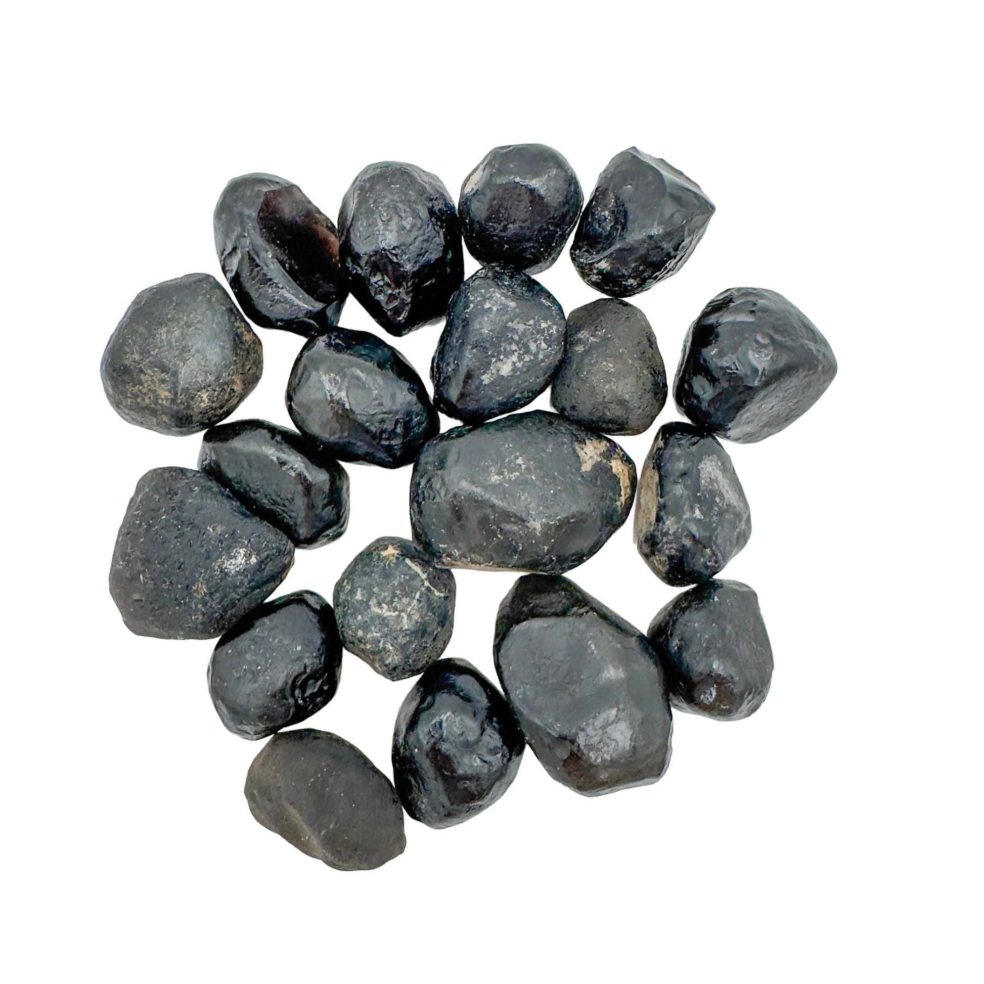 Sideways view of Apache Tear raw stone, showing subtle veining, sourced from Arizona, United States.