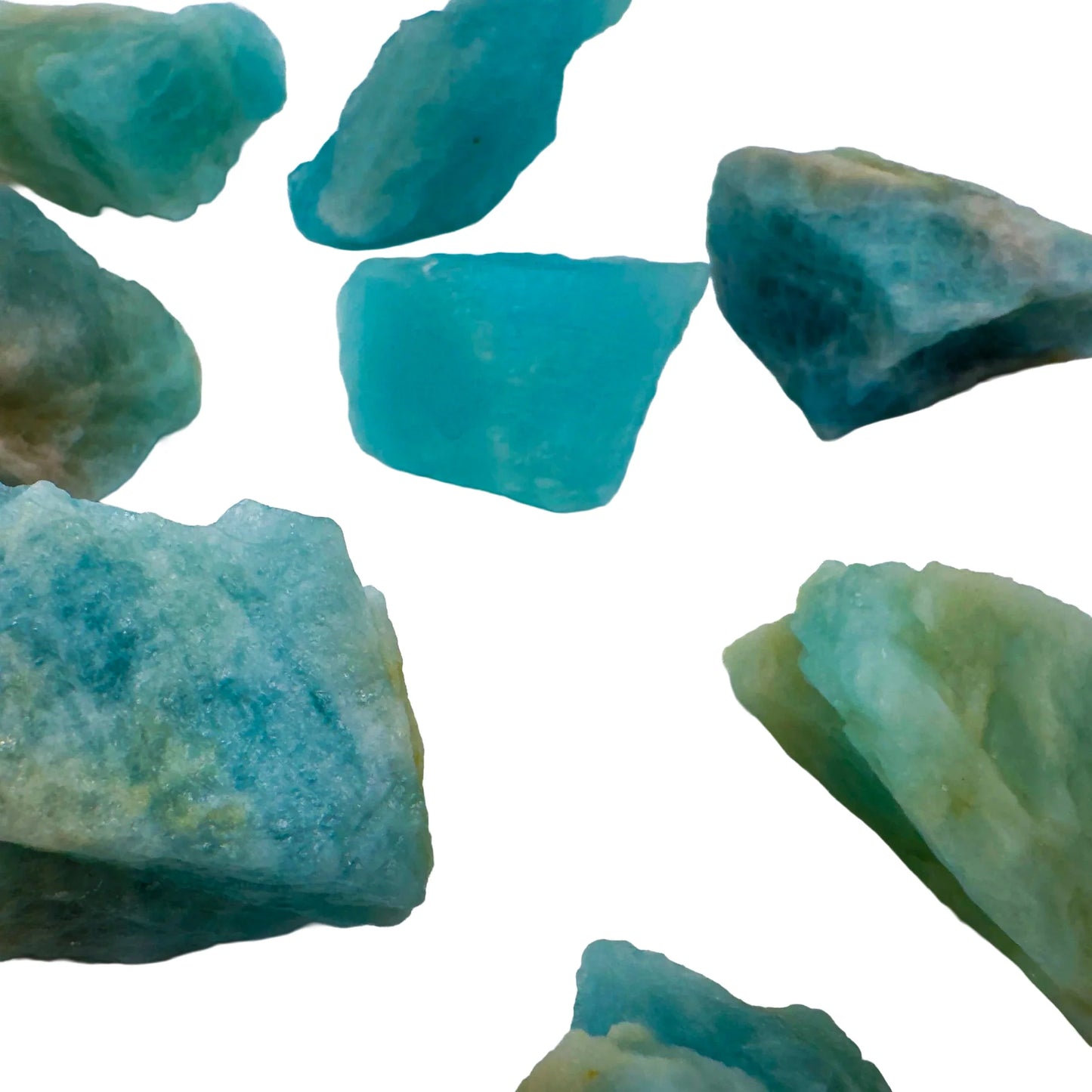 Reverse side of blue Aquamarine raw stone, drawn on for Stress Relief and Emotional Healing, showing natural form.