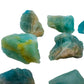 Grade aa aquamarine raw held in hand for size reference