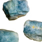 Lateral view of Aquamarine raw stone, showing untreated character.
