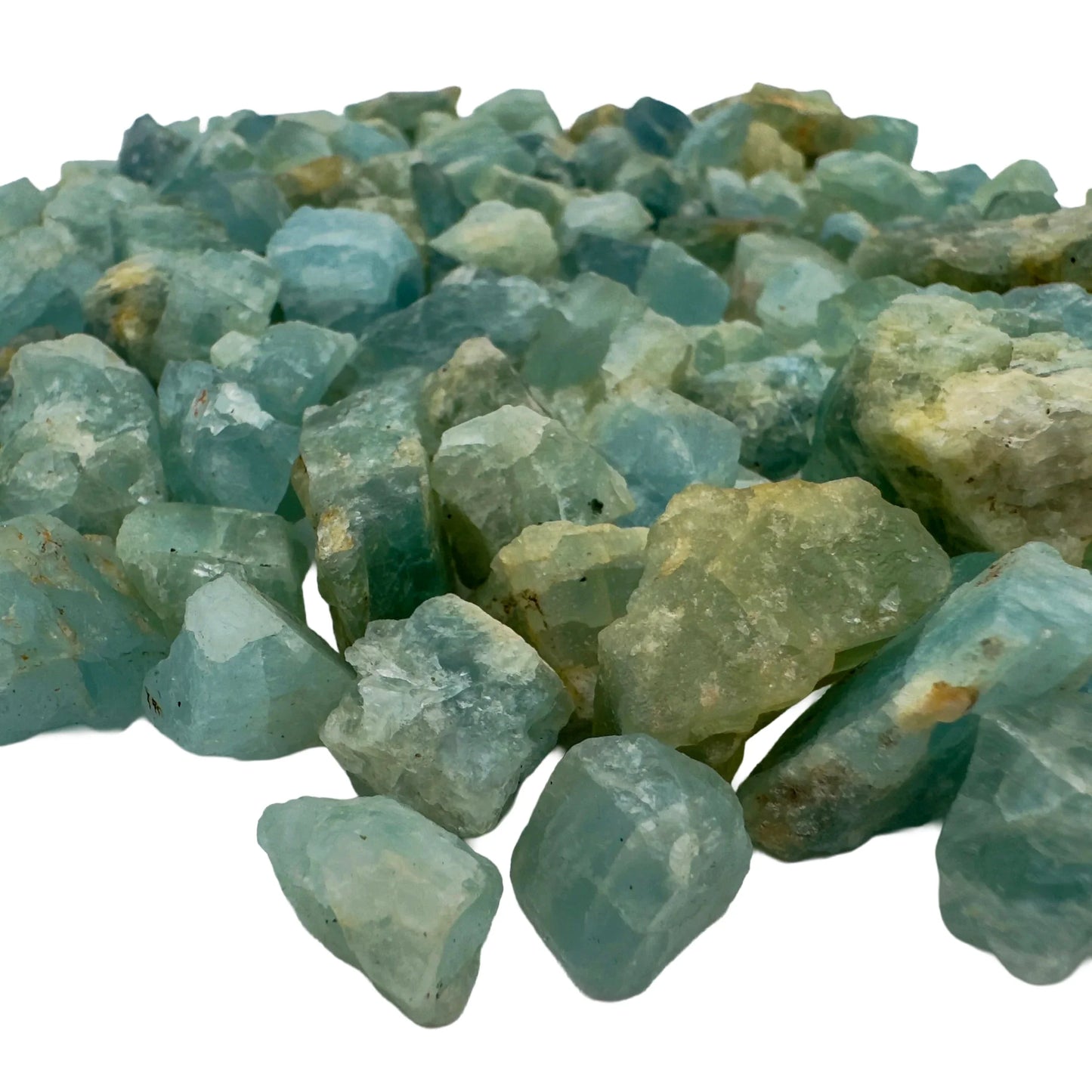 Edge view of Aquamarine raw stone, showing natural form, hand-selected from Huíla Province, Angola.