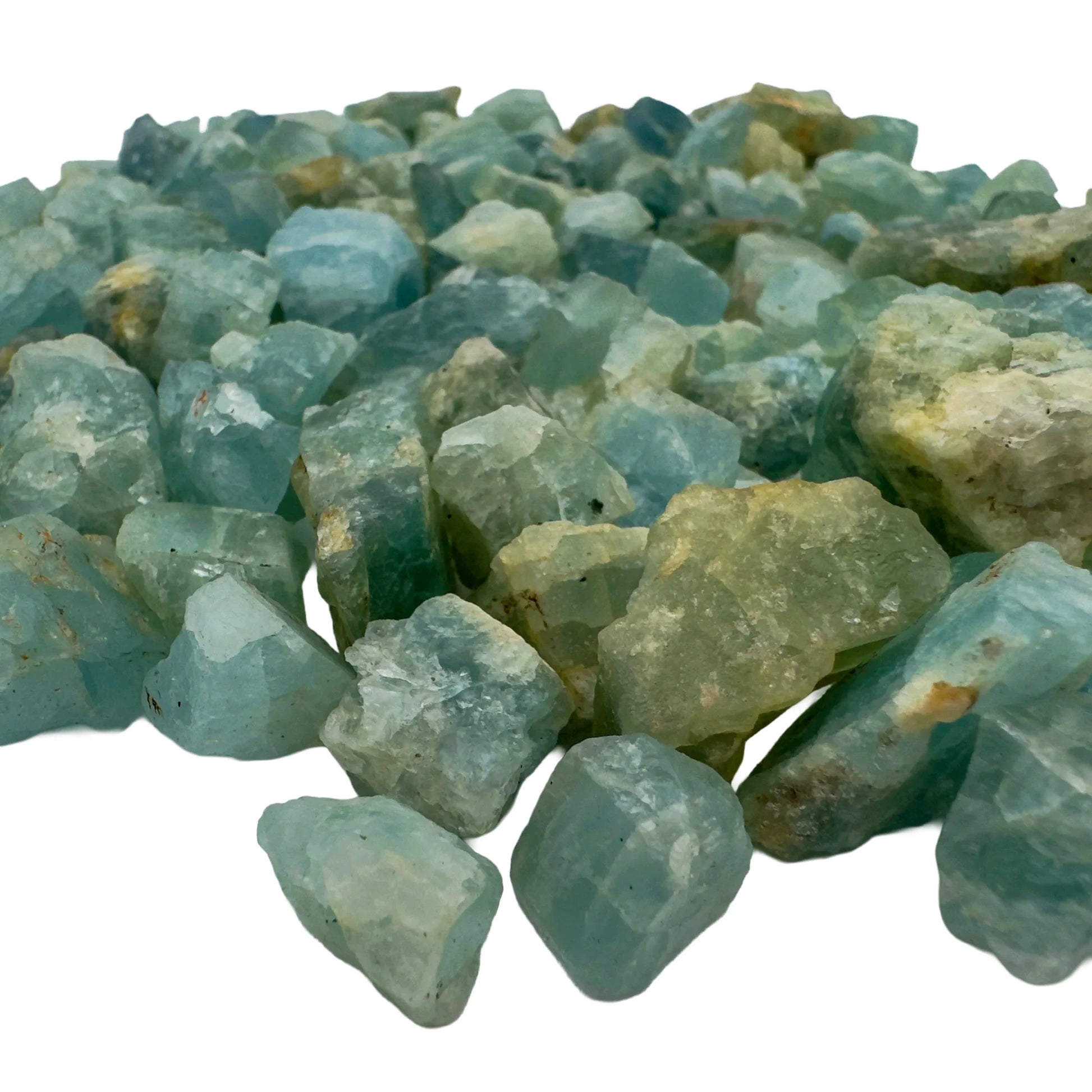 Edge view of Aquamarine raw stone, showing natural form, hand-selected from Huíla Province, Angola.