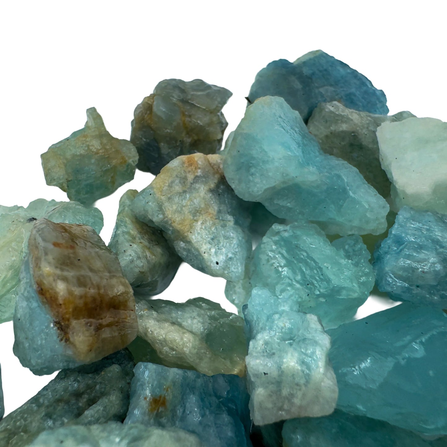 Palm-scale view of a Aquamarine raw stone, hand-selected from Minas Gerais, Brazil.