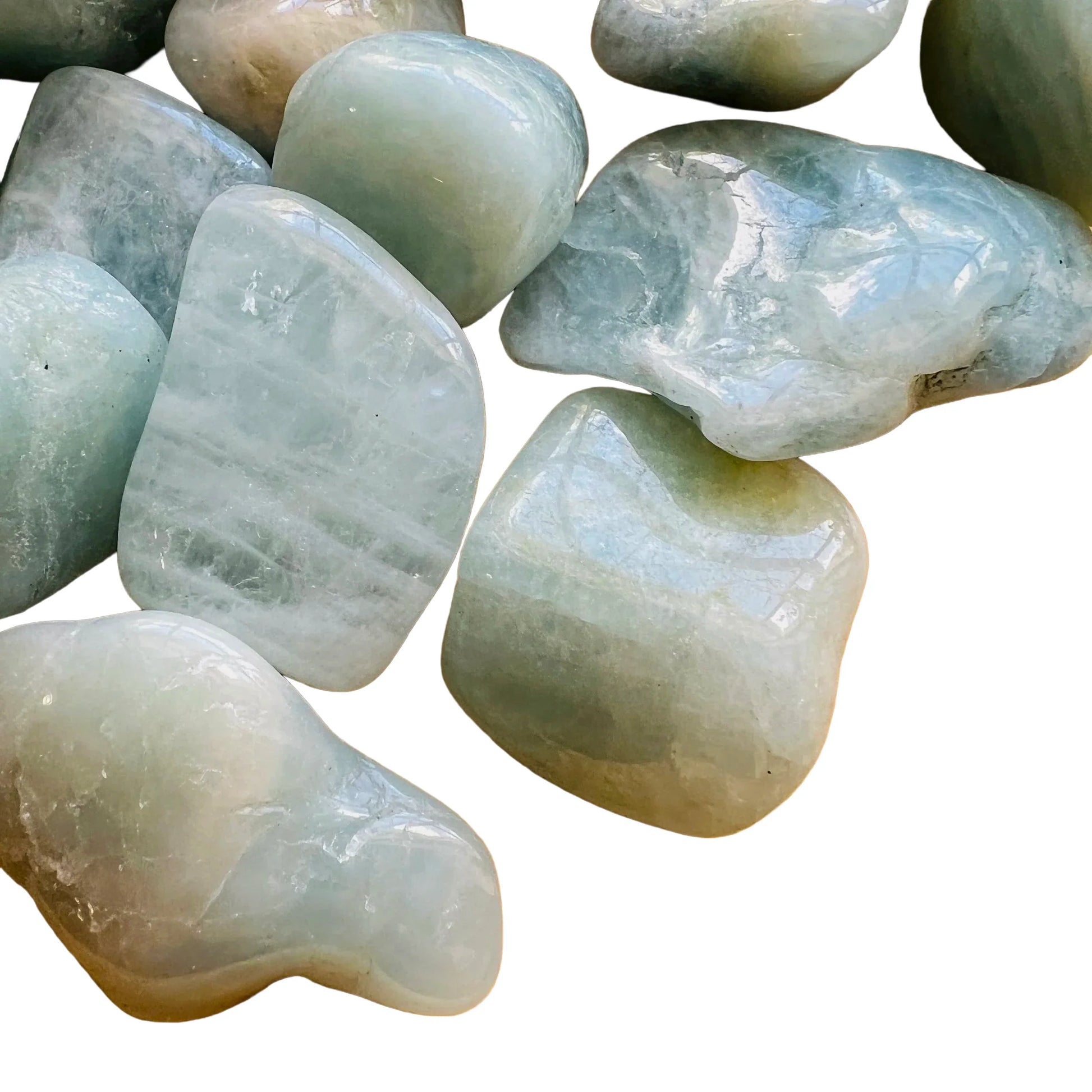 Natural light view of a Aquamarine tumbled stone kept near for Stress Relief.