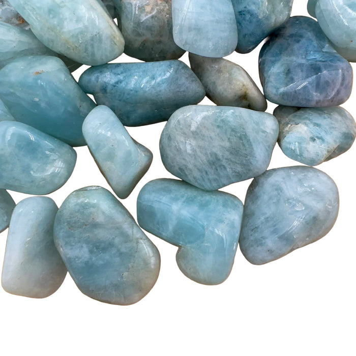 Grain detail of Aquamarine tumbled stone, kept close for Stress Relief, from Brazil.