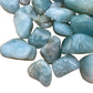 Edge-on view of Aquamarine tumbled stone, from Minas Gerais, Brazil, drawn on for Stress Relief and Emotional Healing.