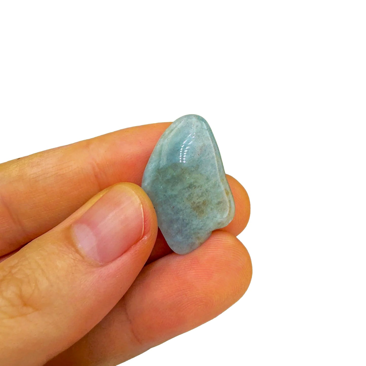 Three-quarter view of Aquamarine tumbled stone, from Minas Gerais, Brazil, captured against a quiet backdrop.