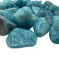 Reverse side of Aquamarine tumbled stone, showing characteristic color, from Brazil.