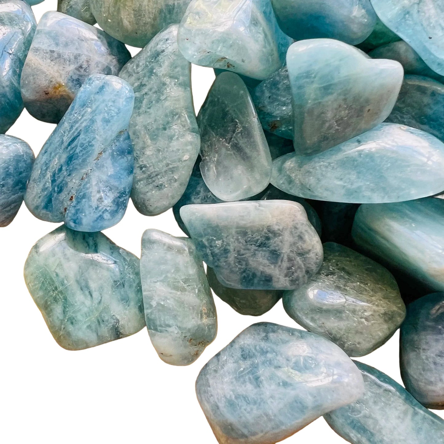 Reverse side of Aquamarine tumbled stone, from Brazil.