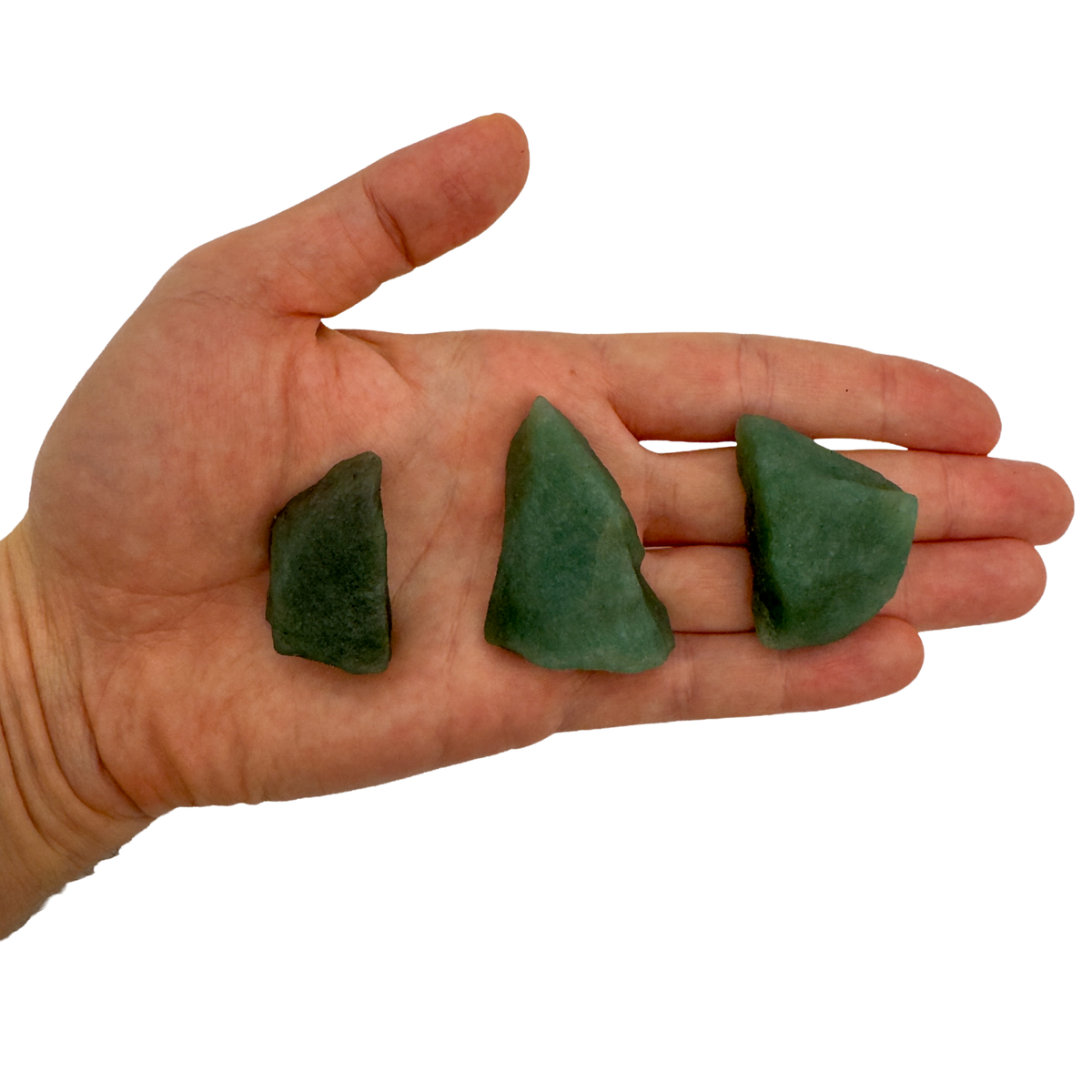 Three AA Grade Green Aventurine raw stones, 1 to 2 inches, held in hand for scale, from Minas Gerais, Brazil.