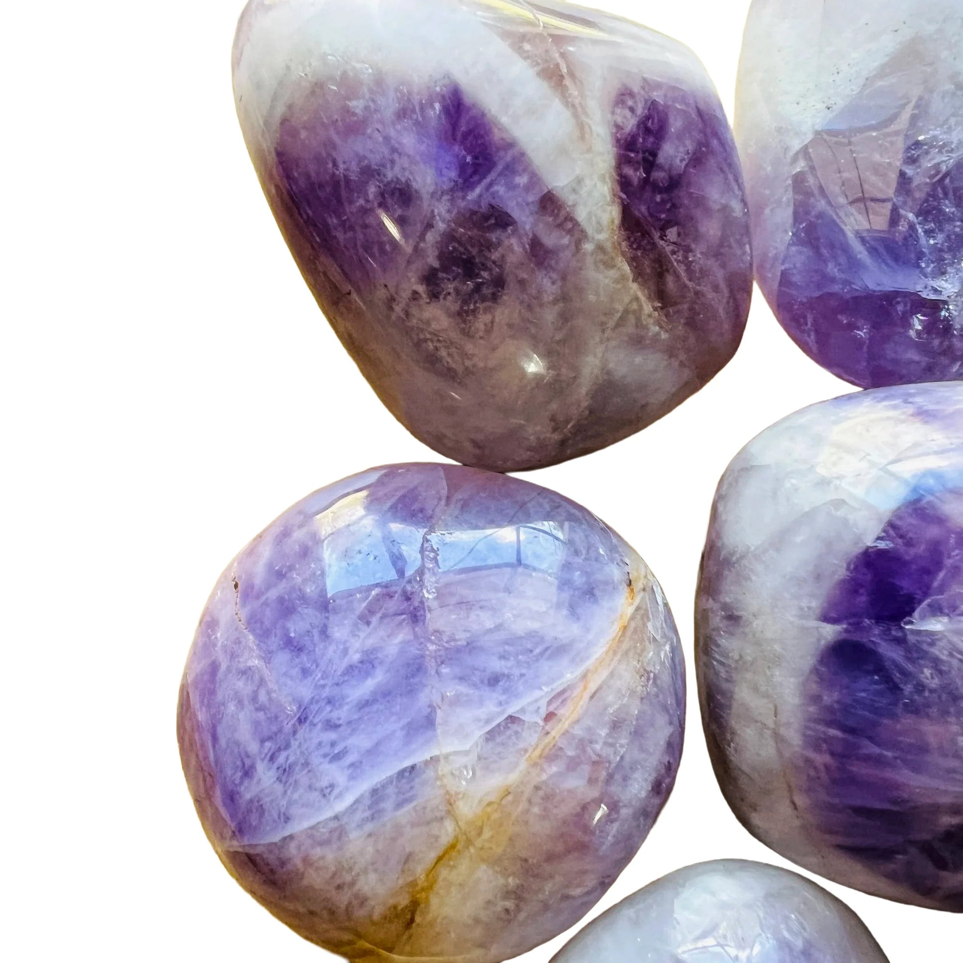 Detail shot of Grade A Banded Amethyst palm stone under natural light