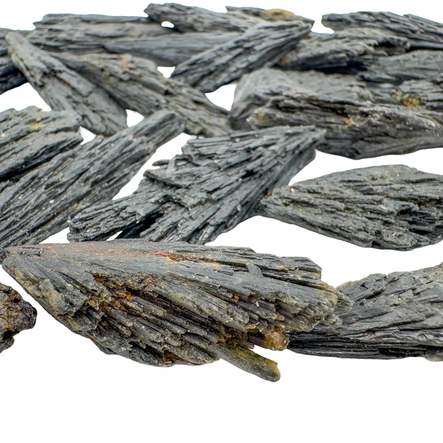 Side-on view of Black Kyanite raw stone, showing natural sheen, from Minas Gerais, Brazil.