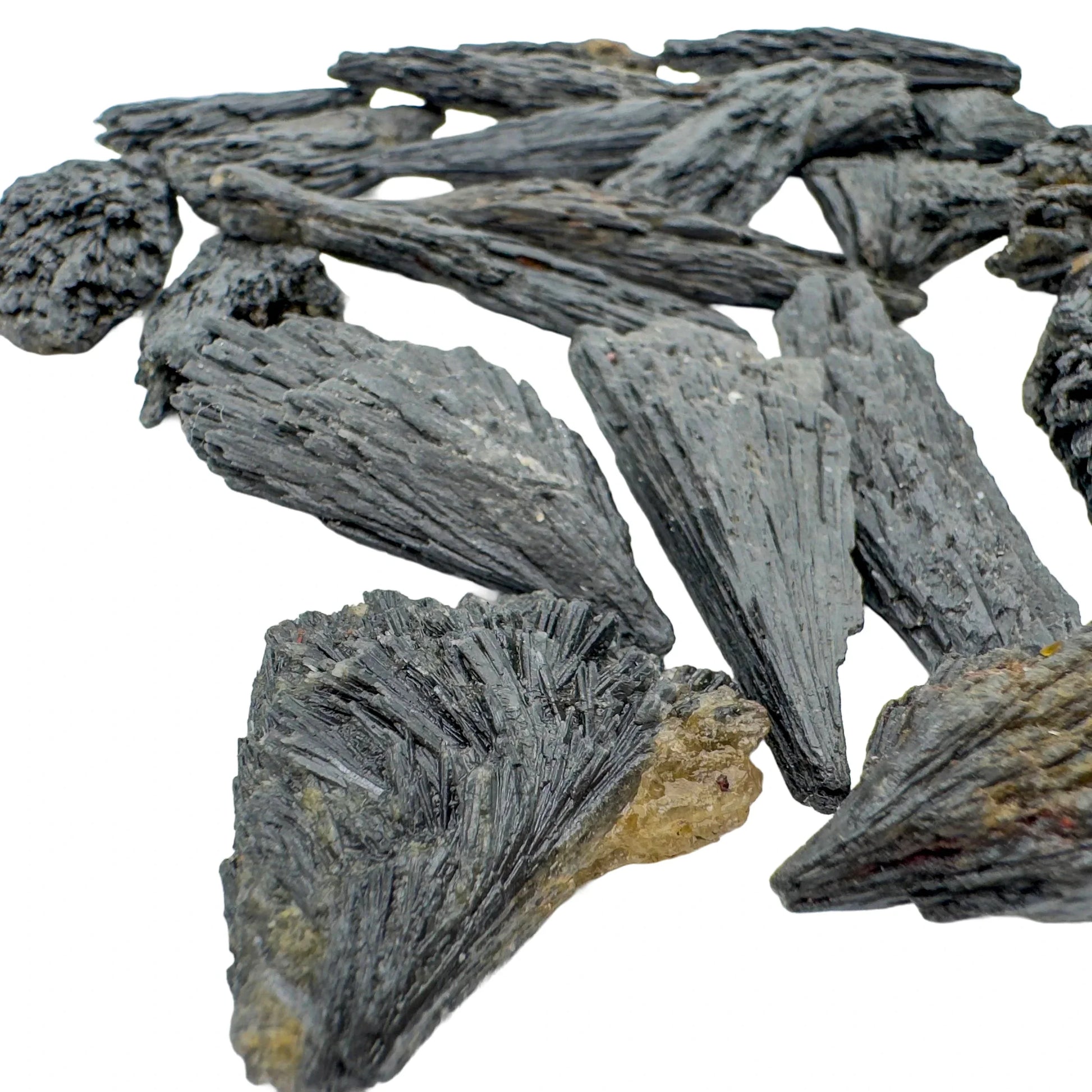 Opposite side of Black Kyanite raw stone, showing characteristic patterning.
