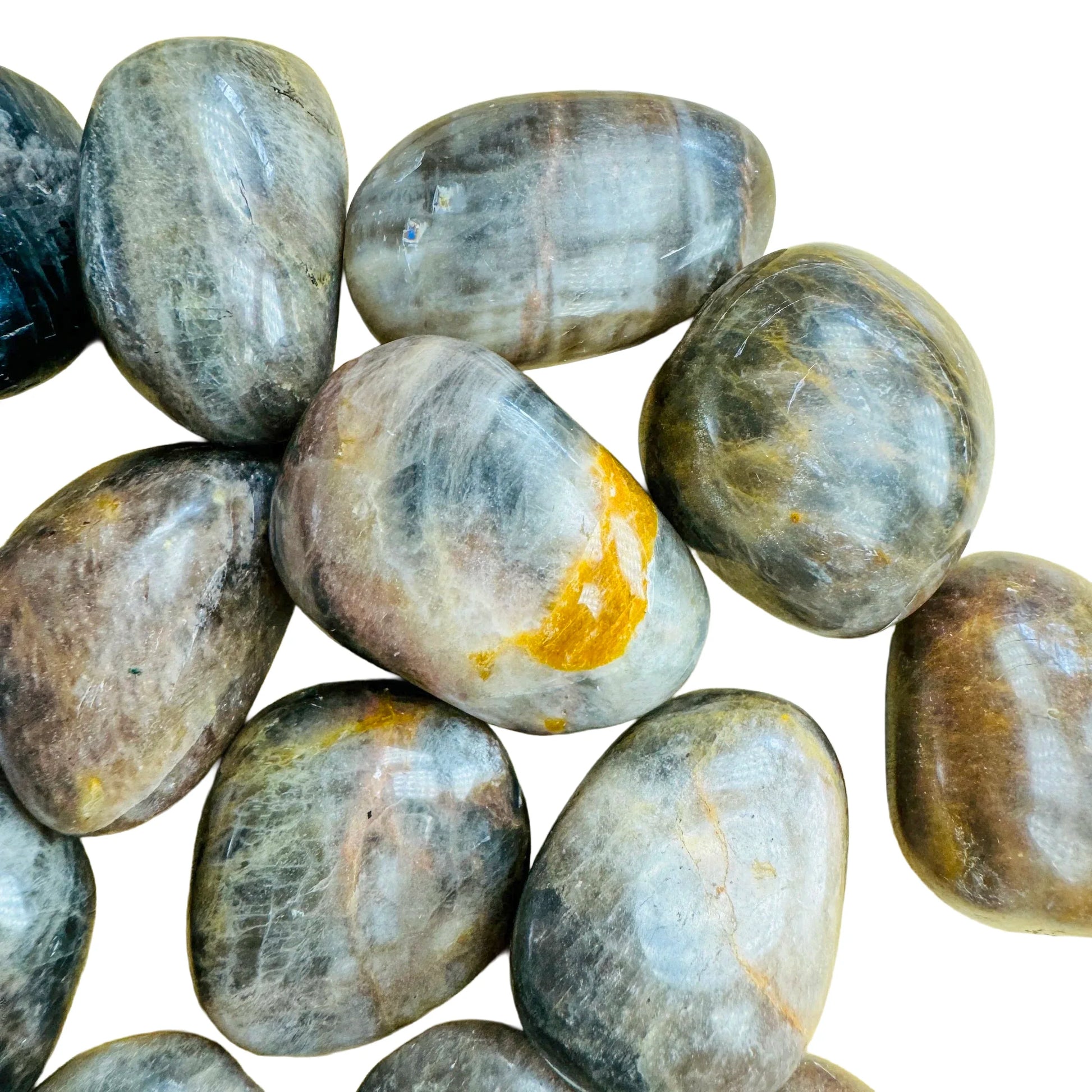 Magnified detail of Grade AA Black Moonstone tumbled stone, showing subtle veining.