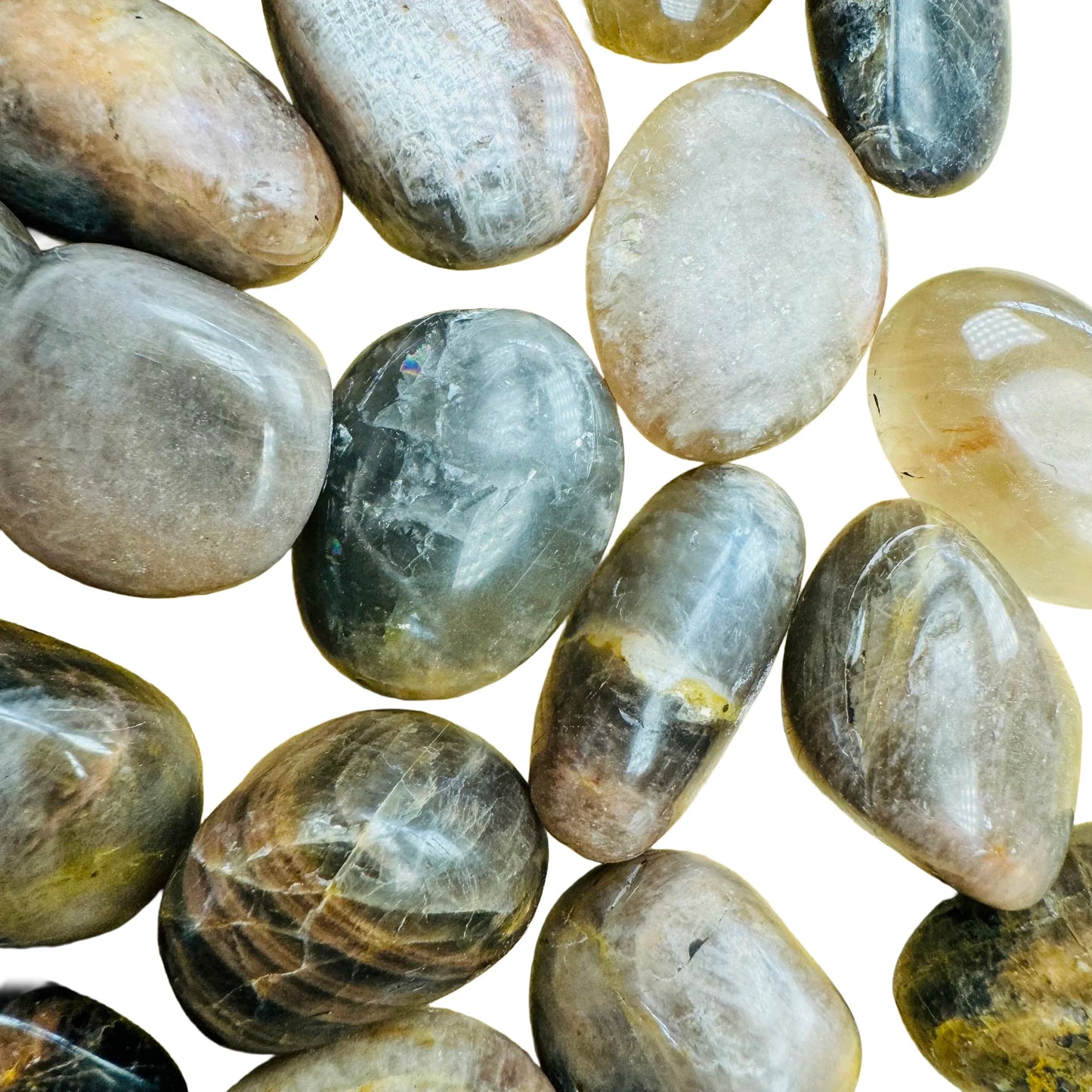 Color detail of Black Moonstone tumbled stone, from Madagascar, to support Grounding.
